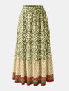 Front view of the Geometric Elastic Waist Maxi Skirt featuring a bold print and comfortable fit.