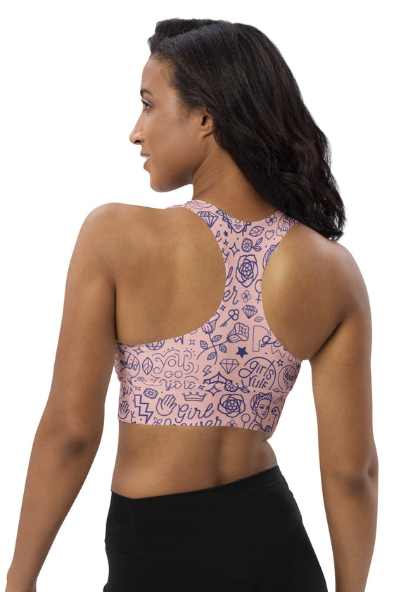 Back view of the Girl Power Print Pink Racerback Sports Bra. Racerback style offers unrestricted movement, while breathable fabric and high-impact support keep you comfortable during workouts.