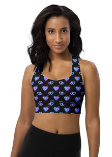  Woman wearing the Glowing Hearts Black Racerback Sports Bra. Featuring glowing heart patterns on a sleek black backdrop, providing high-impact support for intense workouts and stylish activewear.
