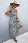 Front of grey printed sleeveless maxi dress with flowy design—modern and effortless daywear for vacations, parks, or casual hangouts.