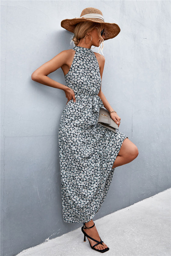 Front of grey printed sleeveless maxi dress with flowy design—modern and effortless daywear for vacations, parks, or casual hangouts.
