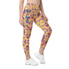 Front view of woman wearing Kaleidoscope Fields high waisted leggings with pockets. Compression fit for women, perfect for yoga, workouts, and casual wear.