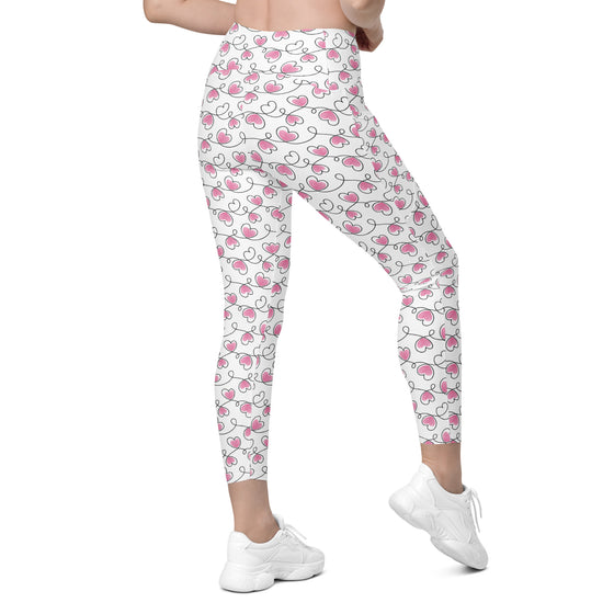 Back view of never ending hearts print leggings. High waist compression leggings with pockets, stylish and supportive for women’s activewear.
