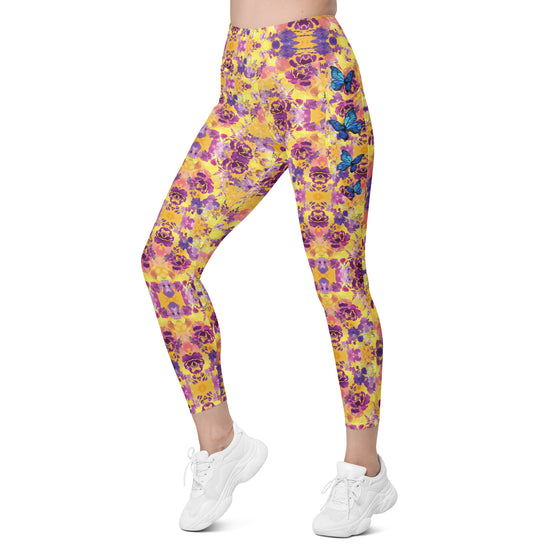 Back view of women's compression leggings in Kaleidoscope Fields print. High waist leggings with tapered legs and pocket detail, ideal for gym and yoga wear.