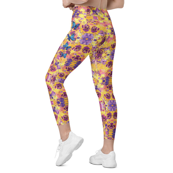 Angled back view of compression leggings with pockets for women. Smooth finish and high waist band offer sculpted support for all-day comfort.