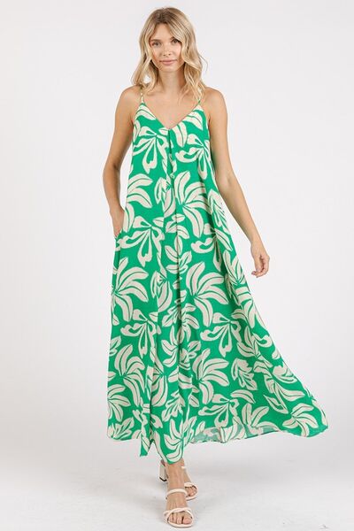 This vibrant kelly green printed v-neck cami maxi dress combines comfort and style with functional pockets, perfect for casual outings.