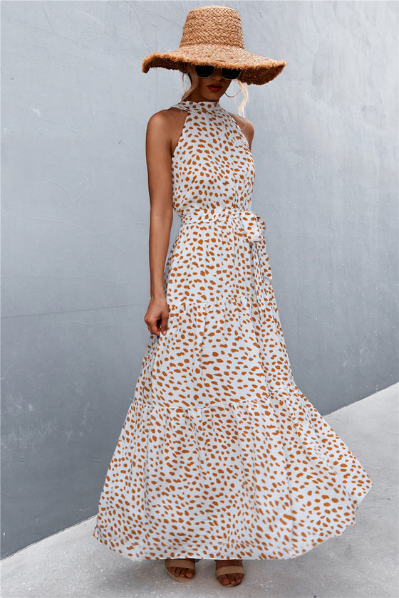 Full front image of khaki printed tie waist maxi dress—casual and cool outfit for relaxed summer afternoons or eco-inspired fashion.