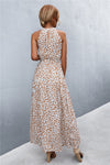 Back view of khaki sleeveless printed maxi dress—clean and easy-to-wear silhouette with soft fabric for all-day comfort.