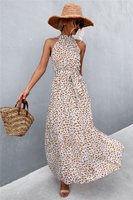 Khaki green printed sleeveless maxi dress with tie waist—earth-toned elegance, ideal for nature walks, getaways, or day-to-night style.