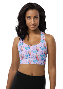  Woman wearing Lavender Butterfly Print Medium Impact Sports Bra. Soft lavender background with a delicate butterfly design. Provides medium-impact support, perfect for yoga, light workouts, or daily wear, ensuring both style and comfort.
