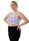 Side view of woman wearing Lavender Butterfly Print Medium Impact Sports Bra in large size. Designed for light workouts and yoga, this medium-impact sports bra features compression fabric and double-layered straps for a secure, comfortable fit.