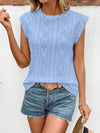 Model smiles in this summery version, focusing on the textured finish and lightweight feel of the top.

