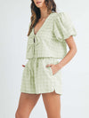 Another front view of the light green set, featuring the feminine puff sleeve details on the top, paired with the comfortable shorts, ideal for a stylish summer ensemble.

