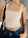 Model styled in the Lovelet Square Neck Tank with denim jeans, showcasing a minimalist and chic look.