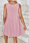 Back view of the Lovelet Wide Strap Mini Tank Dress in soft pink, designed for casual elegance.