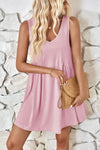 Front view of the Lovelet Wide Strap Mini Tank Dress in soft pink, showcasing its V-neckline and flowy silhouette.