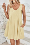 Front view of the Lovelet Wide Strap Mini Tank Dress in soft pink, showcasing its V-neckline and flowy silhouette.