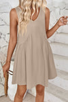 Front view of the Lovelet Wide Strap Mini Tank Dress in soft pink, showcasing its V-neckline and flowy silhouette.