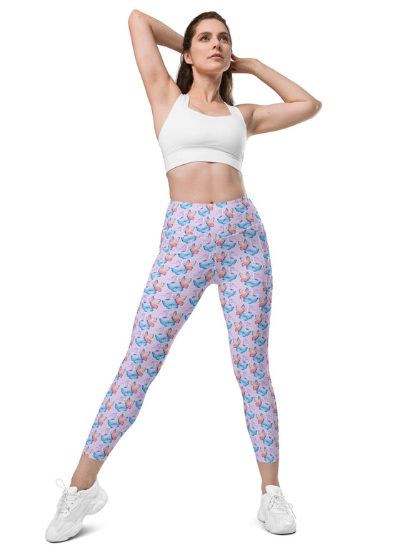 Model showcasing front view of lavender butterfly print high-waisted gym leggings with functional pockets, designed for comfort and style during yoga or workouts.