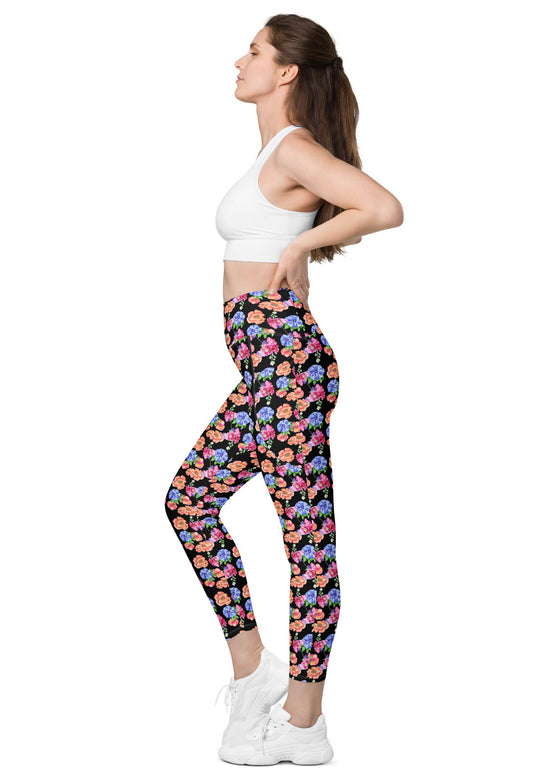 Side view of model in Black Floral High Waisted Leggings with Pockets, designed for a comfortable fit with a chic floral pattern and practical pockets for essentials.