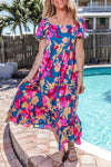 Front view of the Multicolor Square Neck Short Sleeve Midi Dress featuring vibrant colors and a flattering square neckline.
