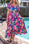 Close-up of the Multicolor Square Neck Short Sleeve Midi Dress showing the intricate pattern and structured square neckline.

