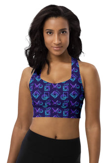  Woman wearing the Neon Geometry Navy High Impact Racerback Sports Bra. Bold neon geometric print on navy backdrop, designed for high support and comfort during intense workouts and active wear.