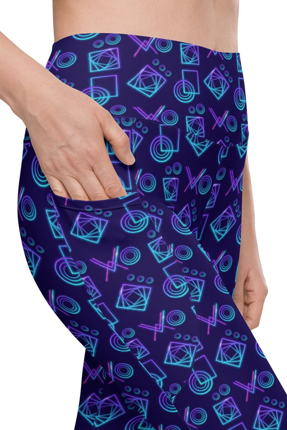 Closeup of Neon Geometry Navy High Rise Gym Leggings showing side pocket design. High-waisted compression leggings for women with functional pockets, ideal for workouts and daily wear.