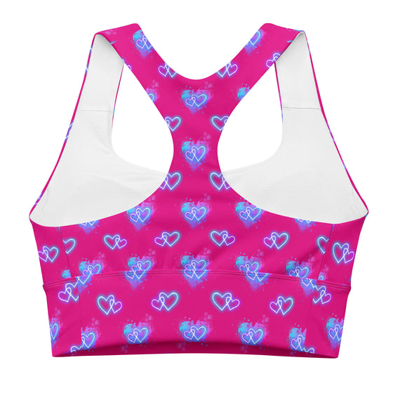 Back view of the Neon Heart Violet Red Racerback Sports Bra. Racerback style enhances flexibility and support, while breathable material and moisture-wicking technology keep you cool during workouts.
