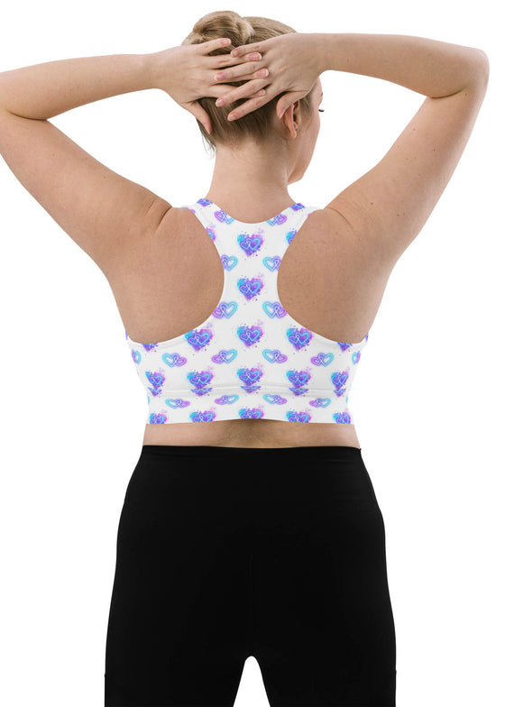 Back view of Neon Hearts White Racerback Longline Sports Bra in large size. Offers excellent support for high-impact exercises with a breathable, comfortable fit, designed for both performance and style.