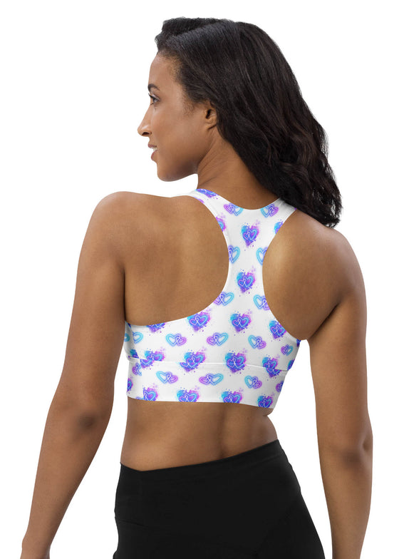 Back view of Neon Hearts White Racerback Longline Sports Bra showcasing racerback design for improved movement and fit. Perfect for intense workouts or relaxed daily wear, offering high support and comfort.
