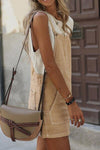 A classic yet trendy tan mini dress that pairs effortlessly with sneakers or heels, offering both comfort and sophistication.

