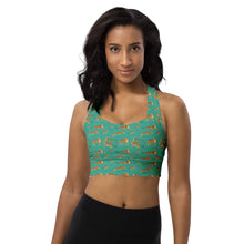  Woman wearing a high-impact racerback sports bra in a vibrant color, showcasing maximum support and comfort. Perfect for high-intensity workouts, running, and active wear. Features moisture-wicking fabric and a supportive fit for all-day wear.