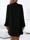 Back view of the Notched Long Sleeve Mini Dress, emphasizing its mini length and classic design.