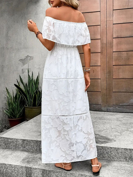 Back view of the off-shoulder short sleeve maxi dress, featuring a flowy silhouette and elegant off-shoulder neckline.