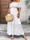 Lifestyle image of a woman wearing the off-shoulder maxi dress, paired with a sunhat and sandals, perfect for summer outings.