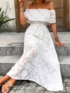 Side view of the off-shoulder short sleeve maxi dress showcasing its semi-sheer lightweight fabric and breezy design.