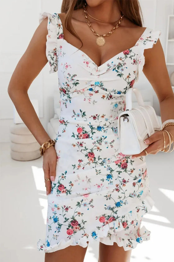 Close-up of off-white floral sweetheart mini dress showing neckline and delicate floral print—elegant summer wear for brunch, dates, or outdoor events.