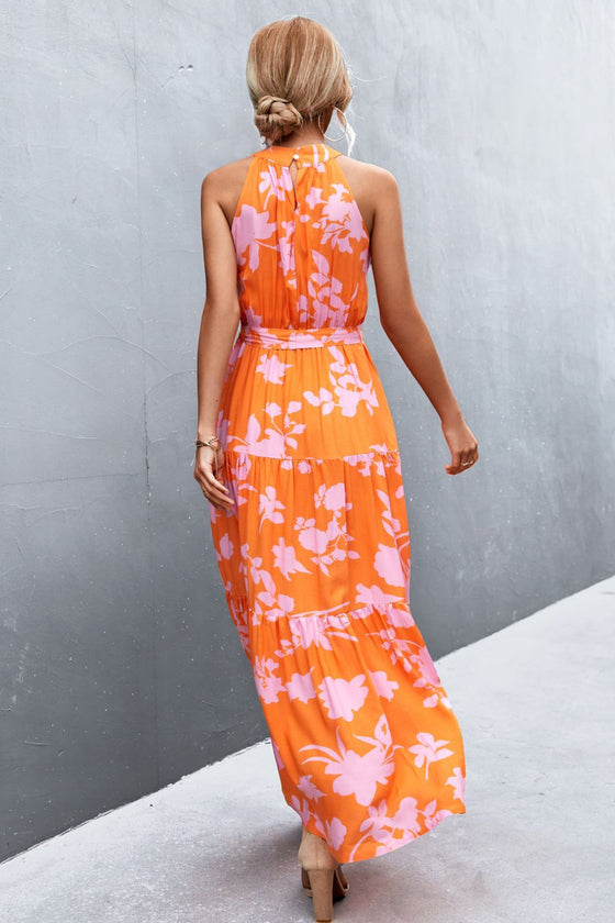 Back image of orange printed tie waist maxi dress—casual-chic outfit with flowing silhouette and modern print for effortless style.