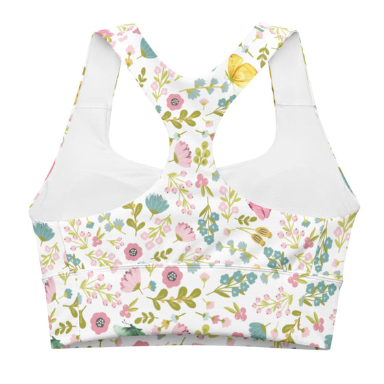 Closeup of racerback detail on Pastel Floral Mist sports bra. Seamless stitching and mesh-lined back offer breathability and full mobility for active wear.