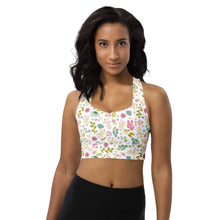  Model wearing Pastel Floral Mist white high impact longline sports bra with racerback. Features soft watercolor floral print and secure compression fit.