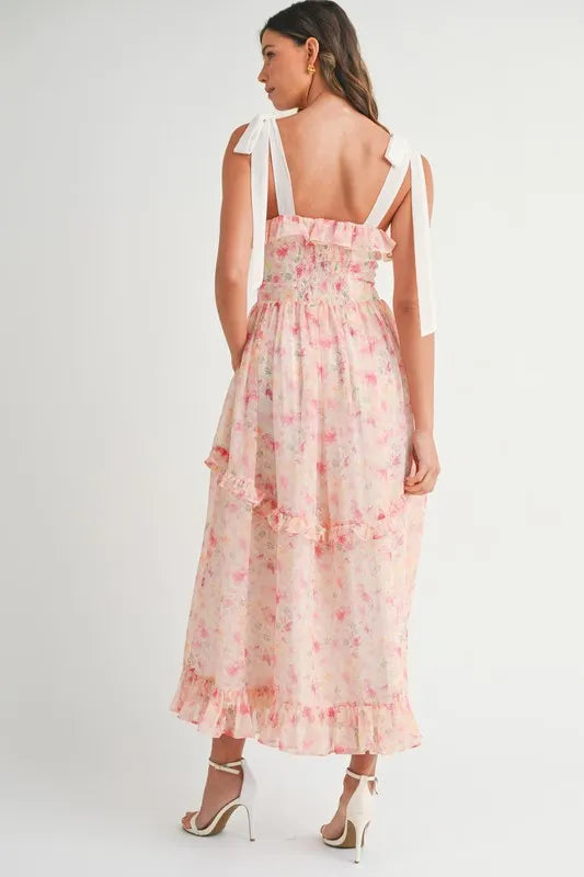 Back view of Pink Floral Shoulder Strap Midi Dress with an open feel and romantic floral touch