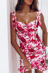 Front image of pink floral printed mini dress with sweetheart neckline—bright, bold, and ideal for feminine fashion lovers.
