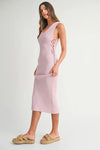 Elegant knit flow captured in the side profile of the Pink Lavender Lace Up Knit Midi Dress with refined shape.