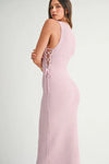 Knit texture highlight from the side view of the Pink Lavender Lace Up Knit Midi Dress for a flattering silhouette.
