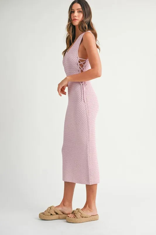 Minimal side style of the Pink Lavender Lace Up Knit Midi Dress showcasing subtle elegance in profile.
