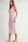  Refined stretchy fit of the Pink Lavender Lace Up Knit Midi Dress captured from the side with clean finishing.