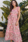 Beautiful full front shot of the pink floral square neck dress featuring side pockets and a flattering fit—perfect for casual outings or summer events.

