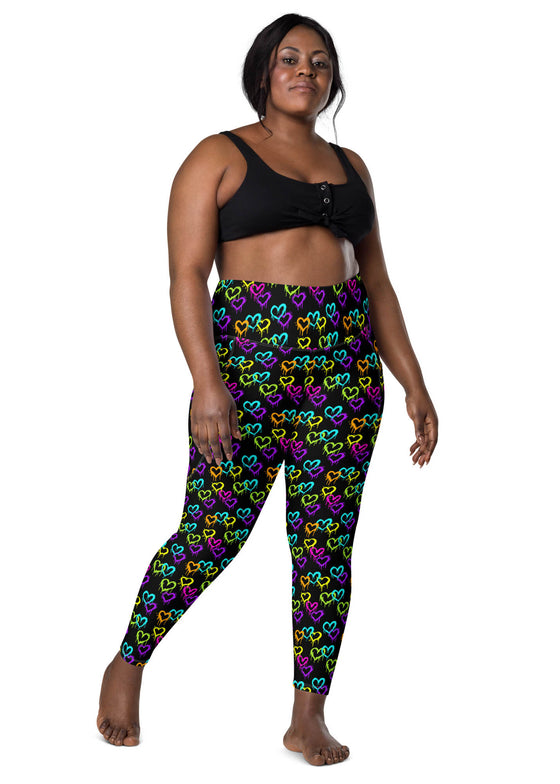 Plus-size model wearing Black Rainbow Melting Hearts High-Waisted Leggings, featuring tummy control, flexible fit, and breathable fabric for women’s workouts.