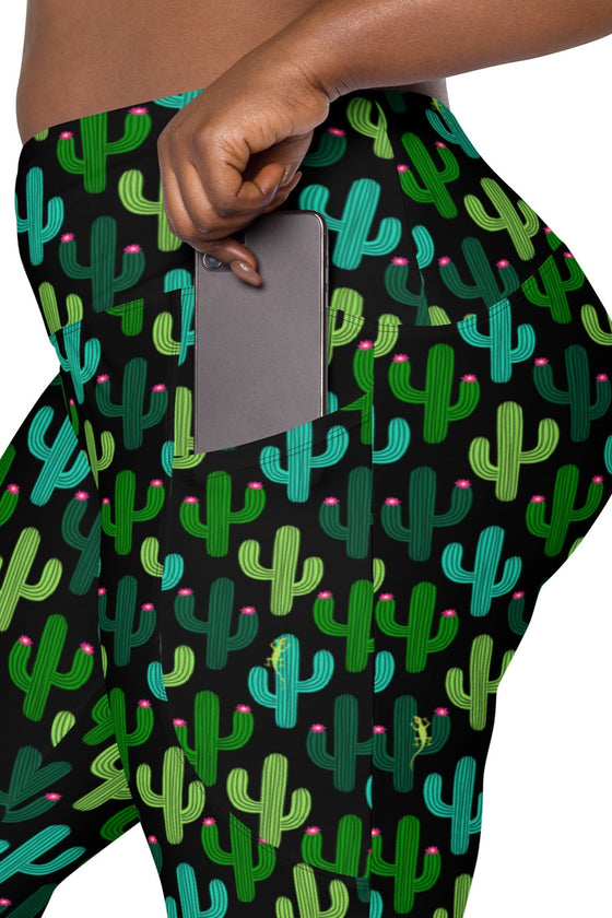 Close-up of the side pocket on plus-size Cactus Bloom Black High-Waisted Leggings, showing its secure design for carrying essentials during workouts.